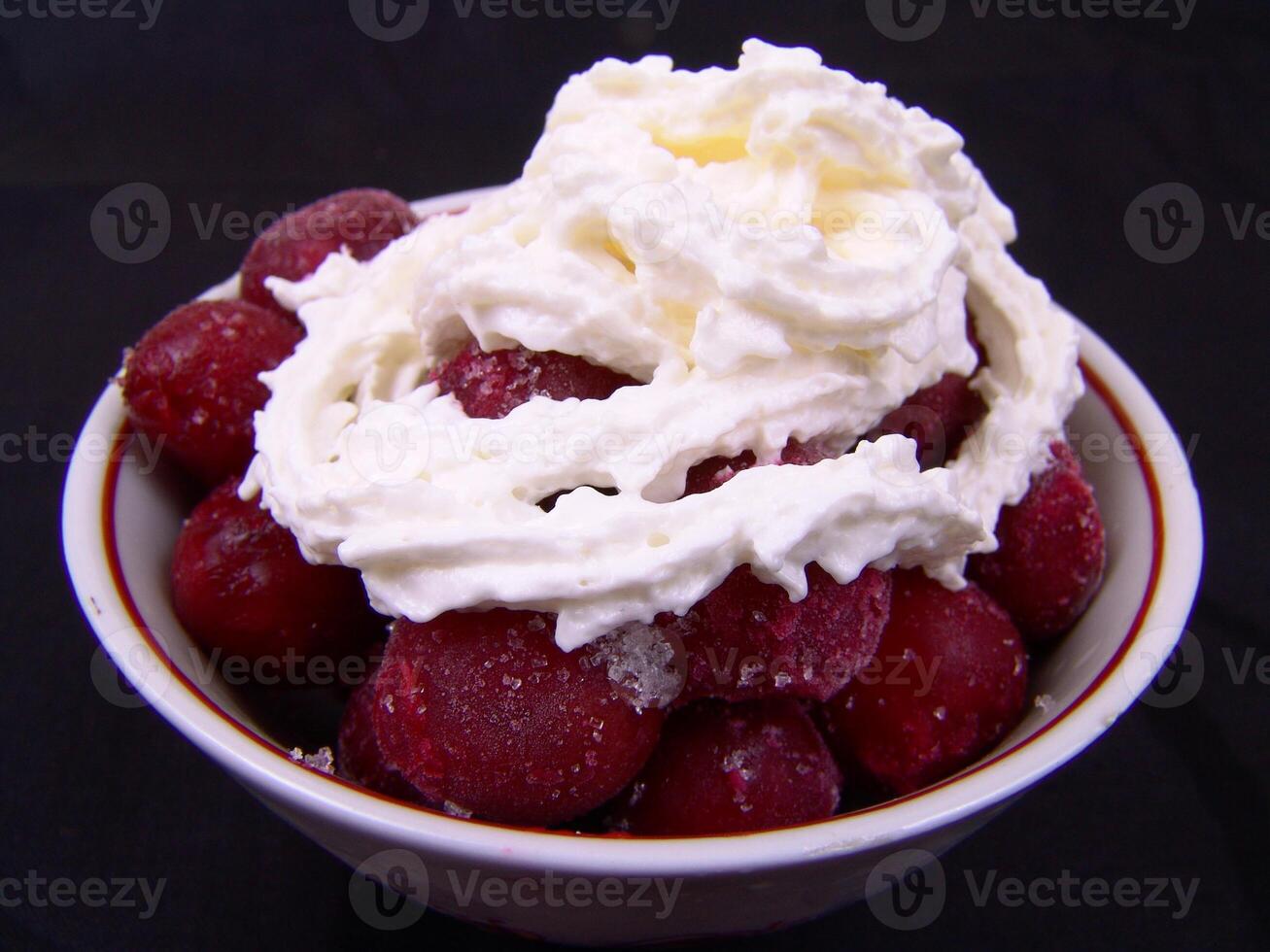 Ice Cream Sundae with Berries on Tableware photo