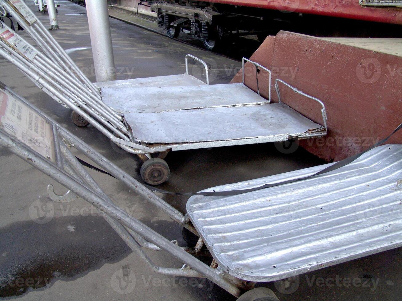 Motor Vehicle Parked Next to Outdoor Furniture on a Road Surface photo