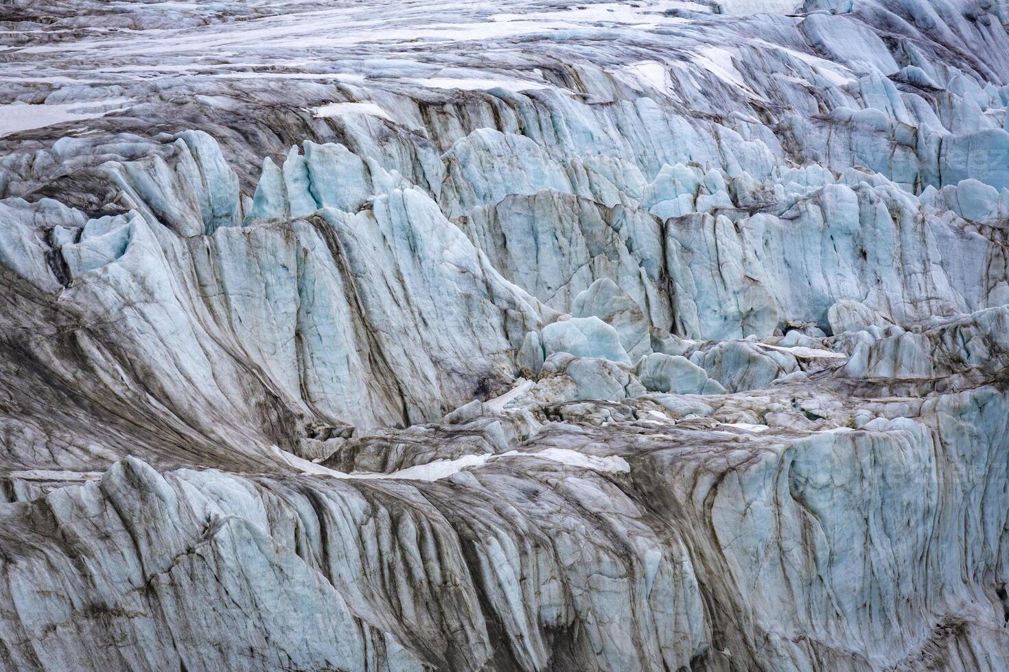 cruising in the Arctic in the Magdalensfjord on Svalbard along a glacier photo