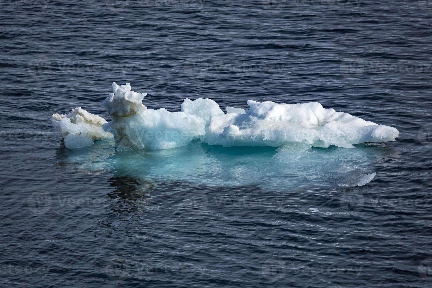 Cruising at perfect weather in the Arctic with an expedition between Nordaustlandet and Spitsbergen on Svalbard, Norway photo