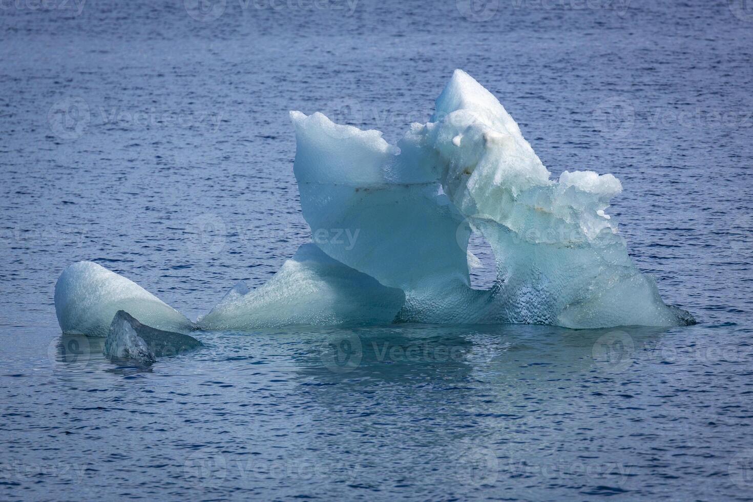 Cruising at perfect weather in the Arctic with an expedition between Nordaustlandet and Spitsbergen on Svalbard, Norway photo