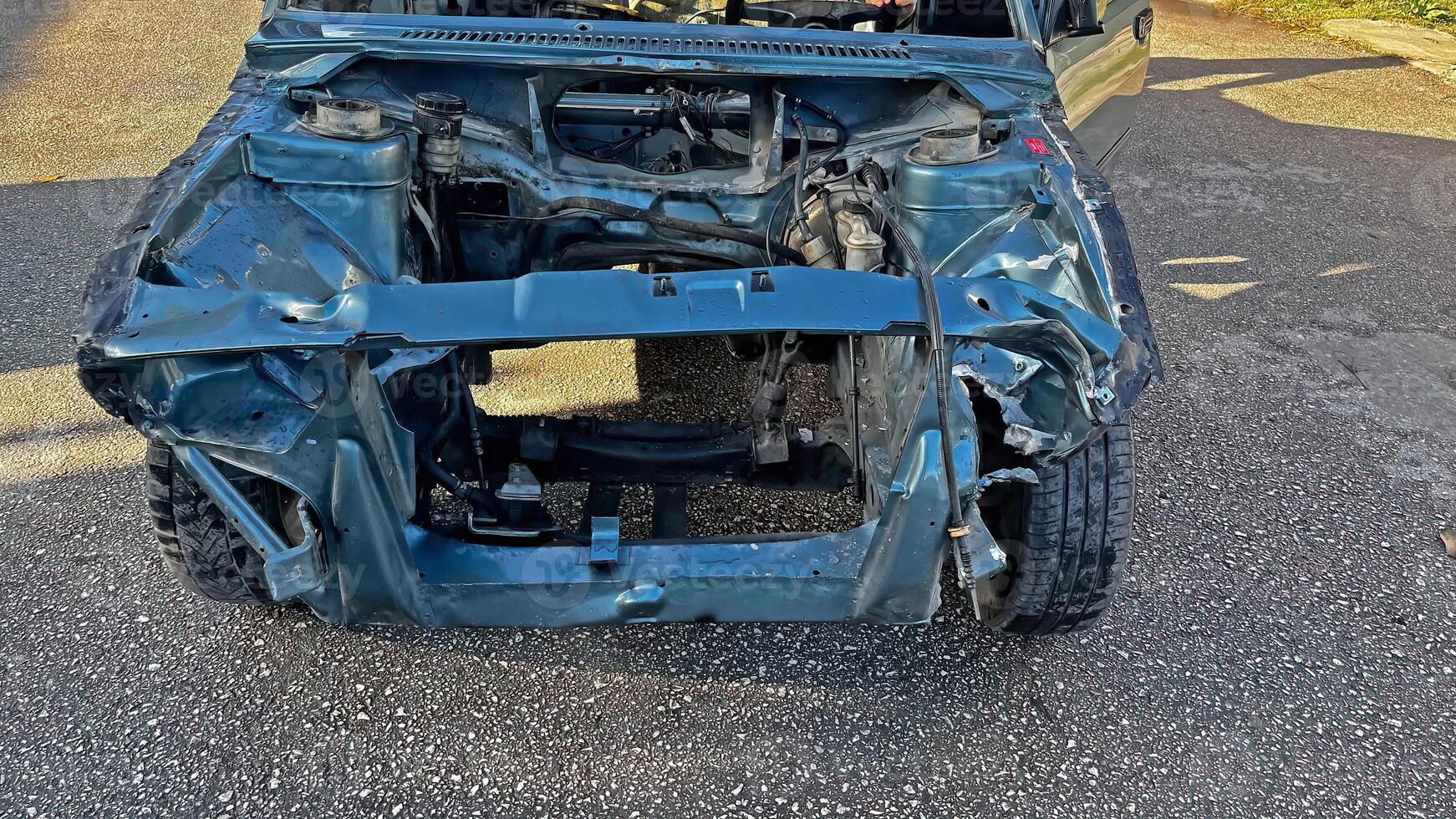 Crashed car in the garage. photo