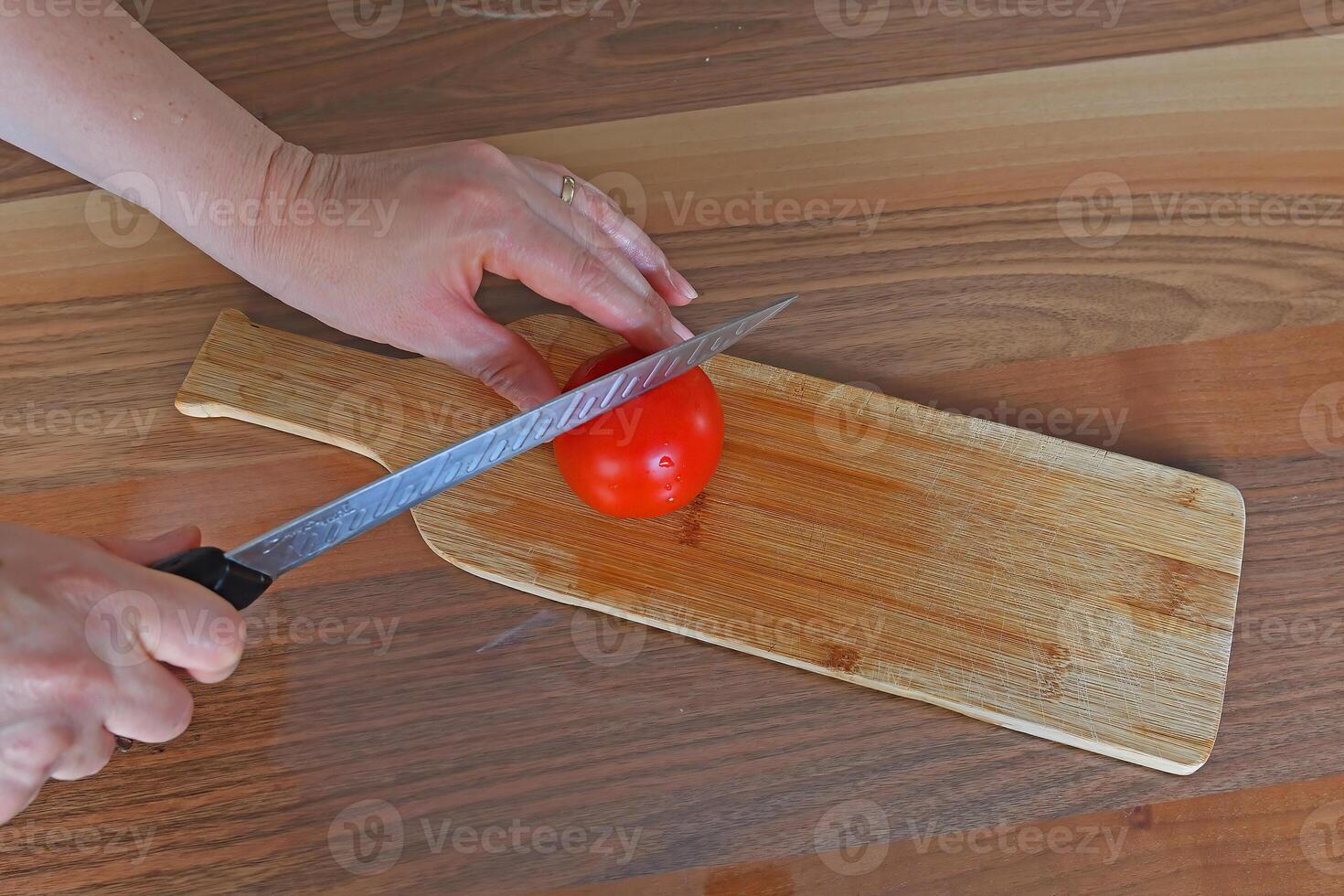 Tomatoes for salad chopping. photo