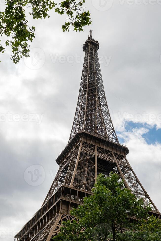Close-up view of the Eiffel Tower. photo