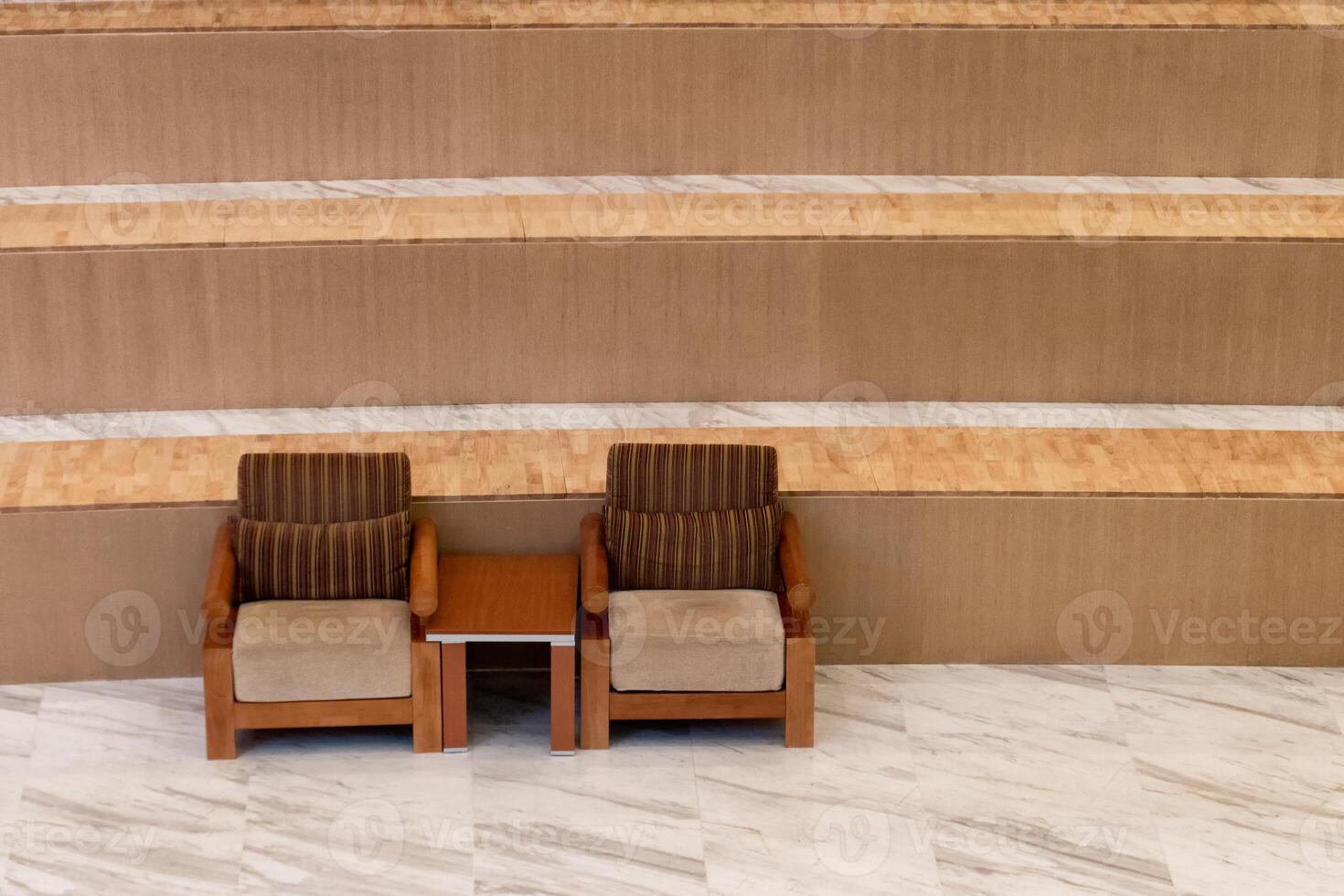 Wooden chairs with mattress on stair photo