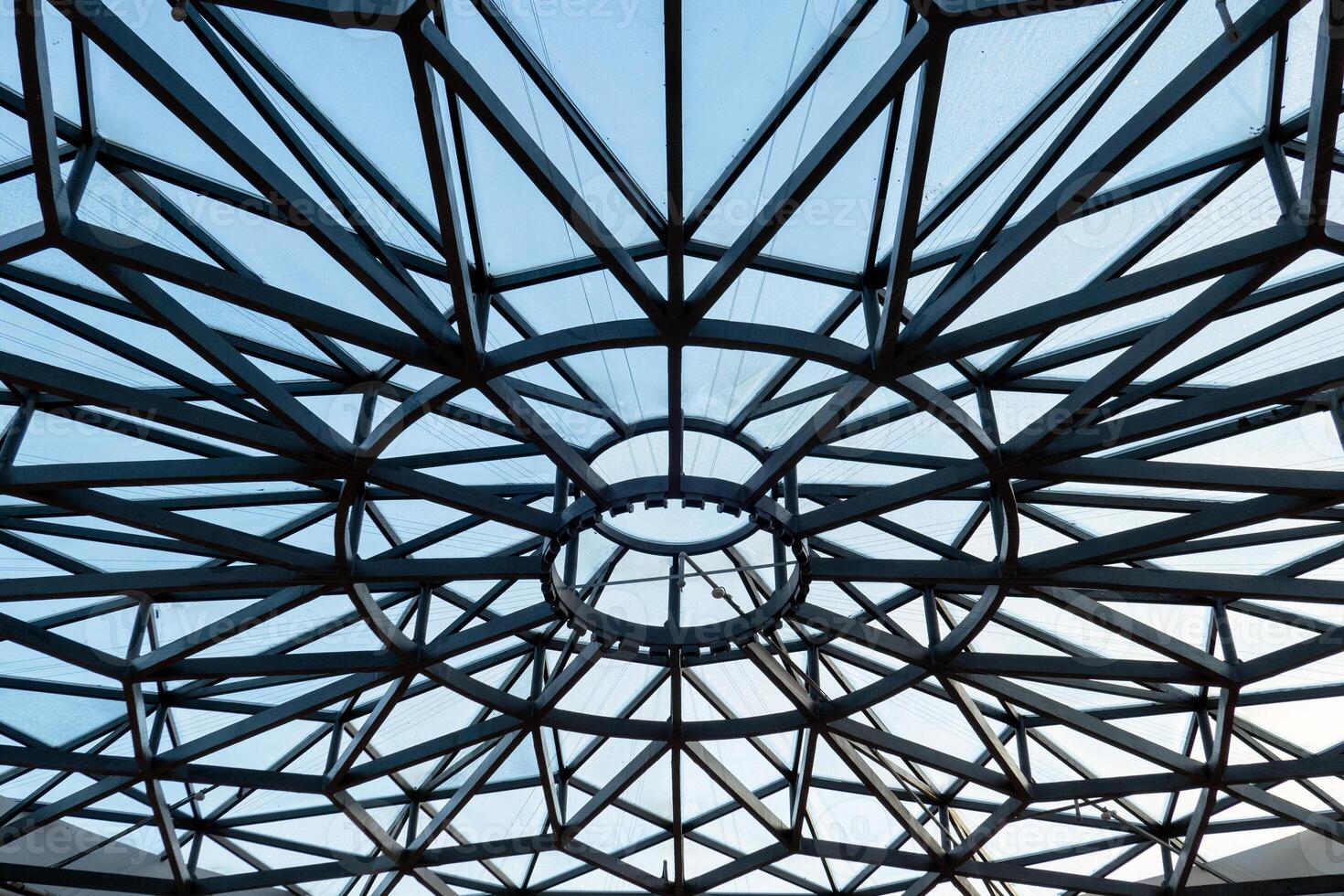 Metal roof shape of spider web covered photo