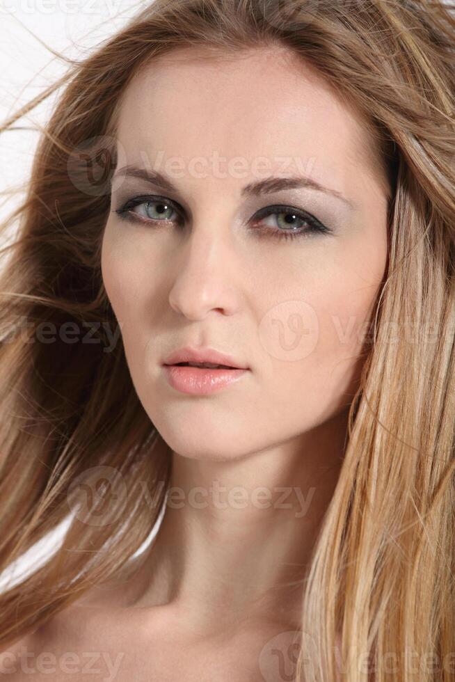 Portrait of the beautiful blond girl photo