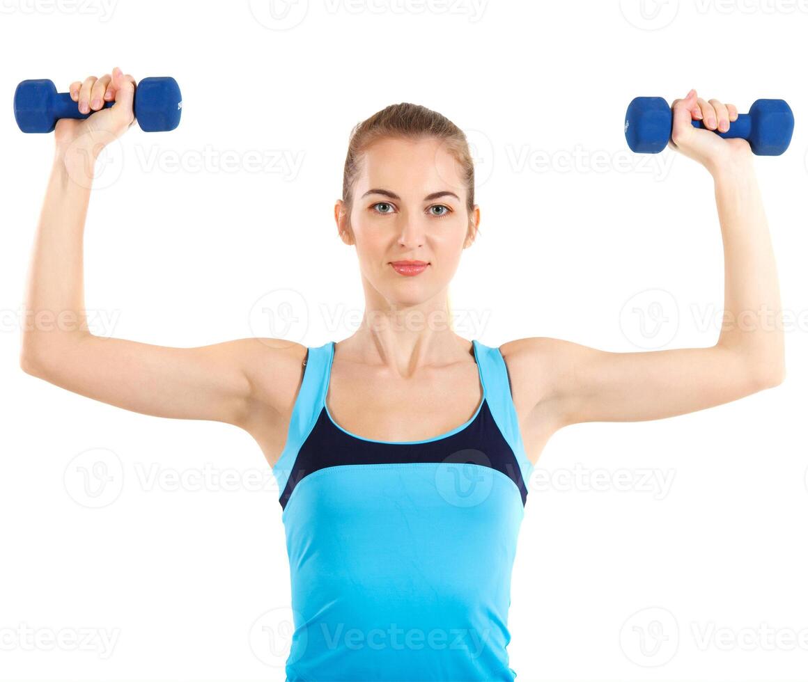 Sporty woman with blue barbells photo
