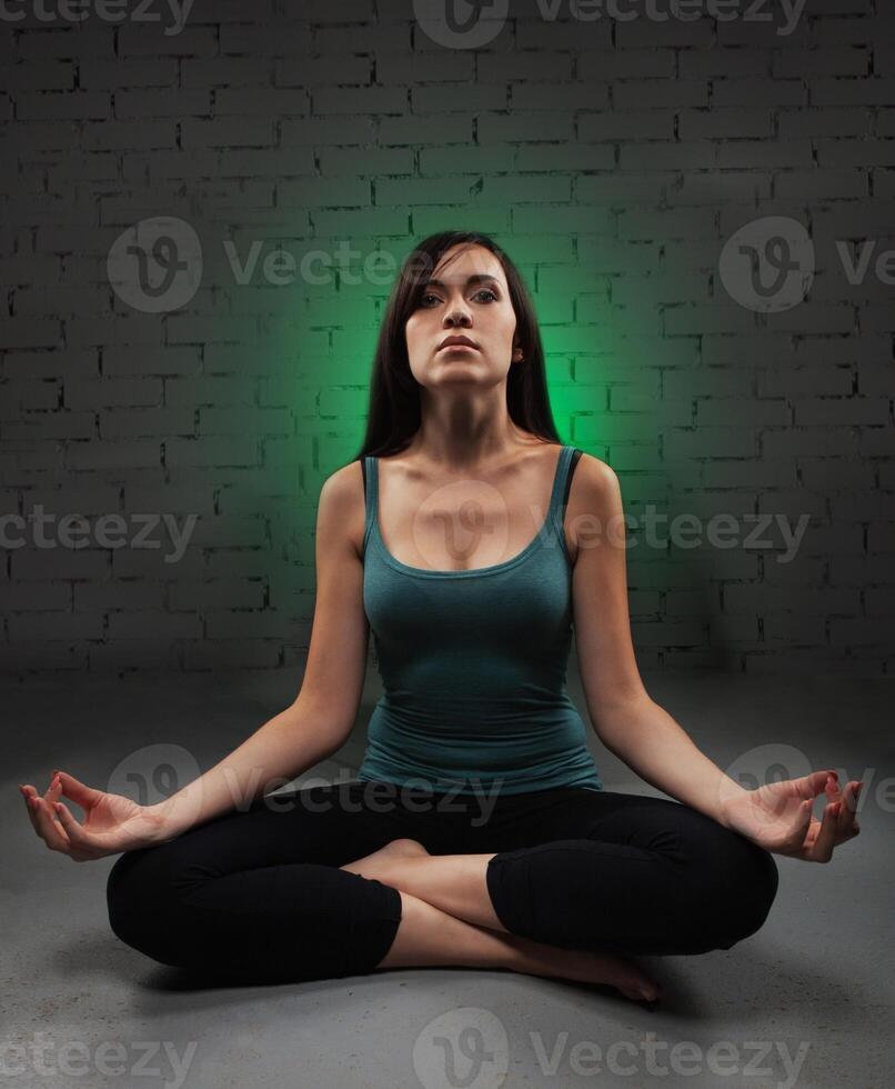 Young woman doing yoga photo
