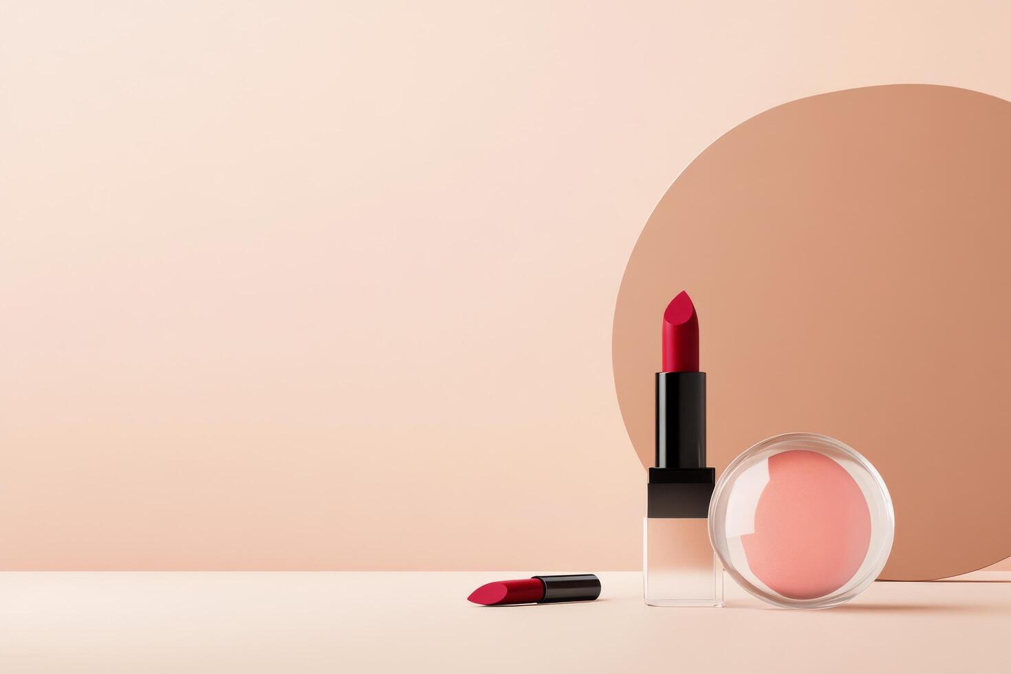 Stylish makeup display featuring red lipstick and cream blush against soft background photo