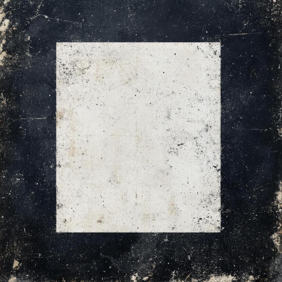 Abstract art composition emphasizing a textured black and white square on a weathered surface photo