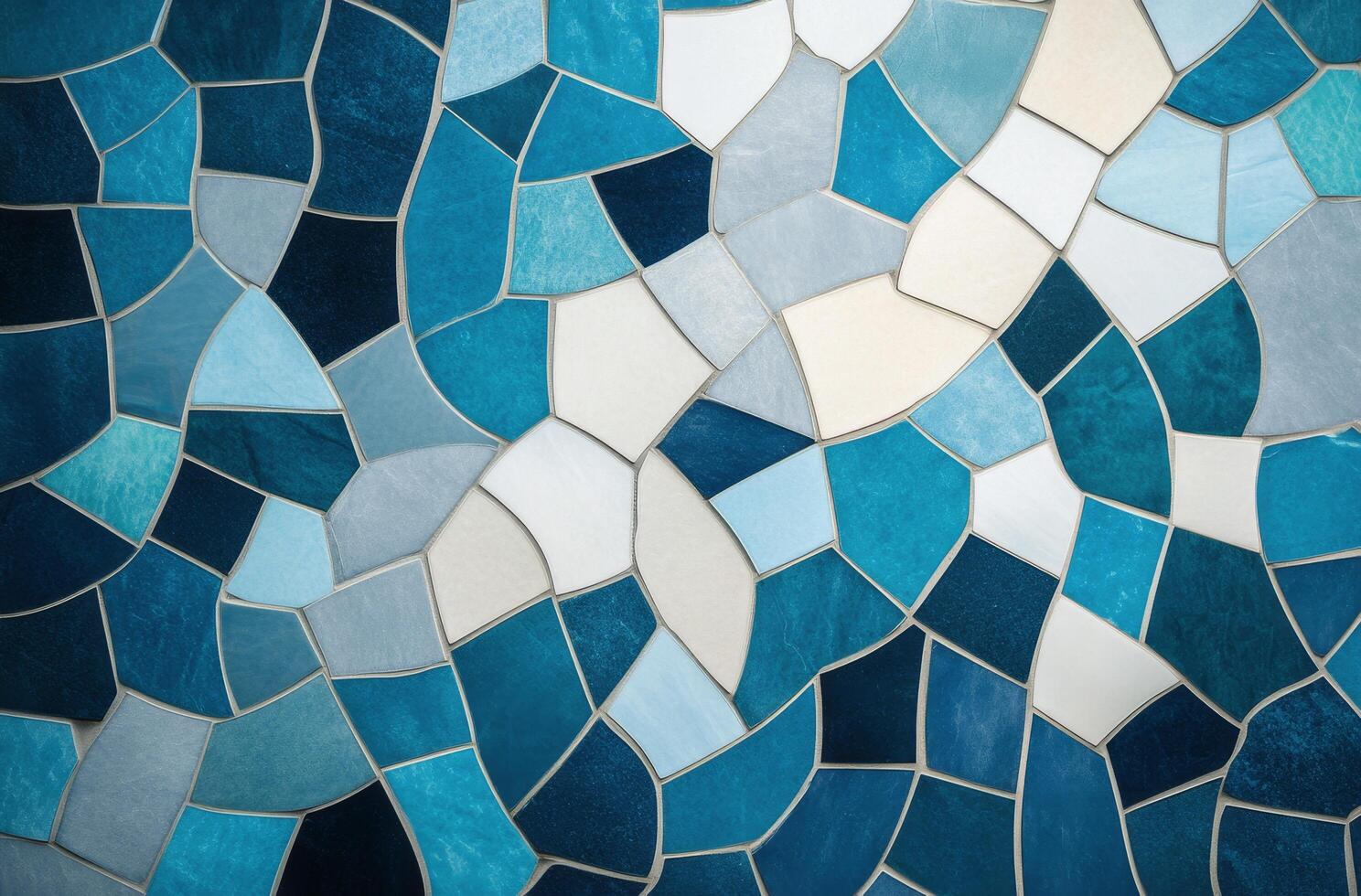 Abstract mosaic design featuring blue and white patterns resembling waves and water photo
