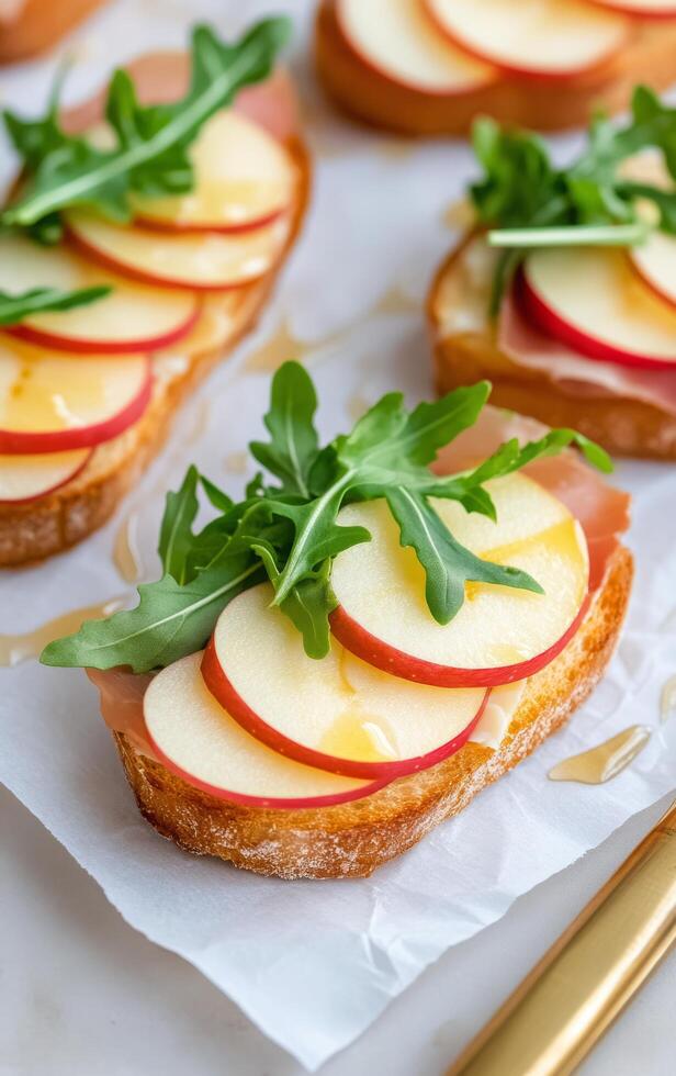 Delicious apple and arugula toast with ham on crisp bread for a healthy snack option photo