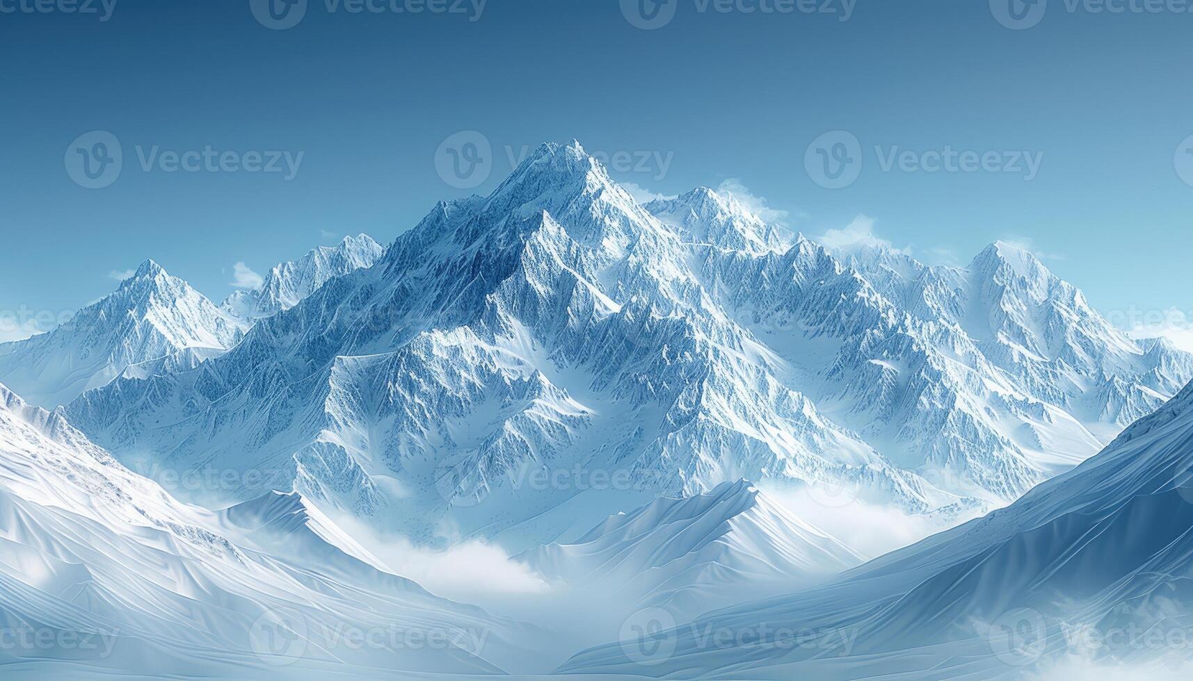 Snow-Covered Mountain Range Under a Clear Blue Sky photo