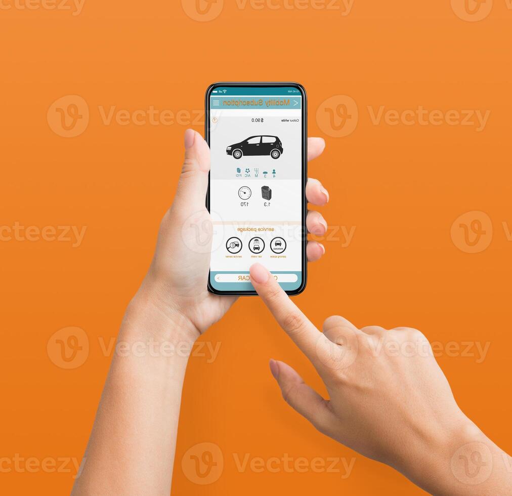 Woman using cellphone with car rent app on screen, orange background, pov photo