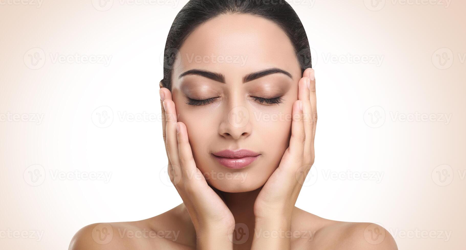 Beautiful thoughtful indian girl face with closed eyes, perfect skin make up closeup. Beauty and health care. Ideal portrait of brunette, isolated on white background photo