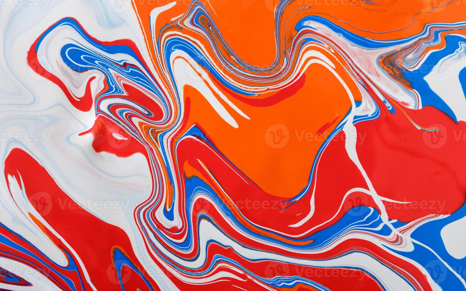 Liquid marbling paint background. Fluid painting abstract texture, blue and red. Intensive color mix photo