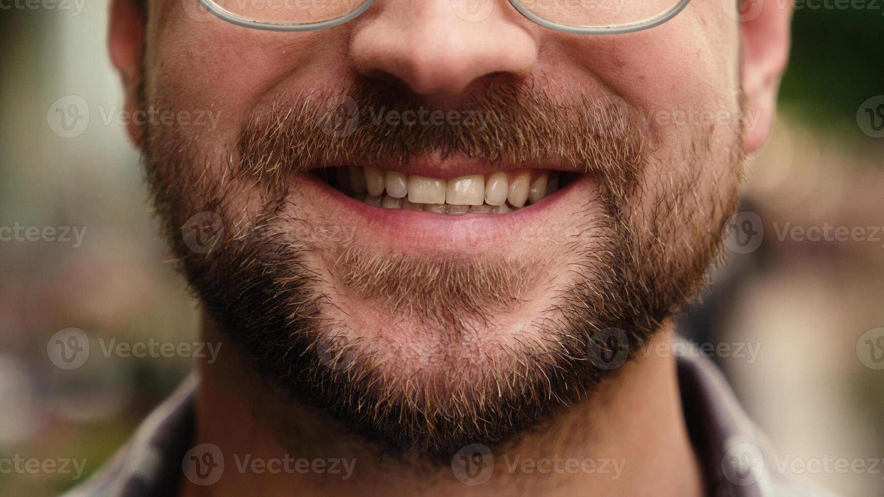 Close up male mouth guy bearded face details Caucasian happy man lips teeth surgery health care medical insurance healthy toothy smiling dental oral whitening smile beard grooming cropped shot in city photo