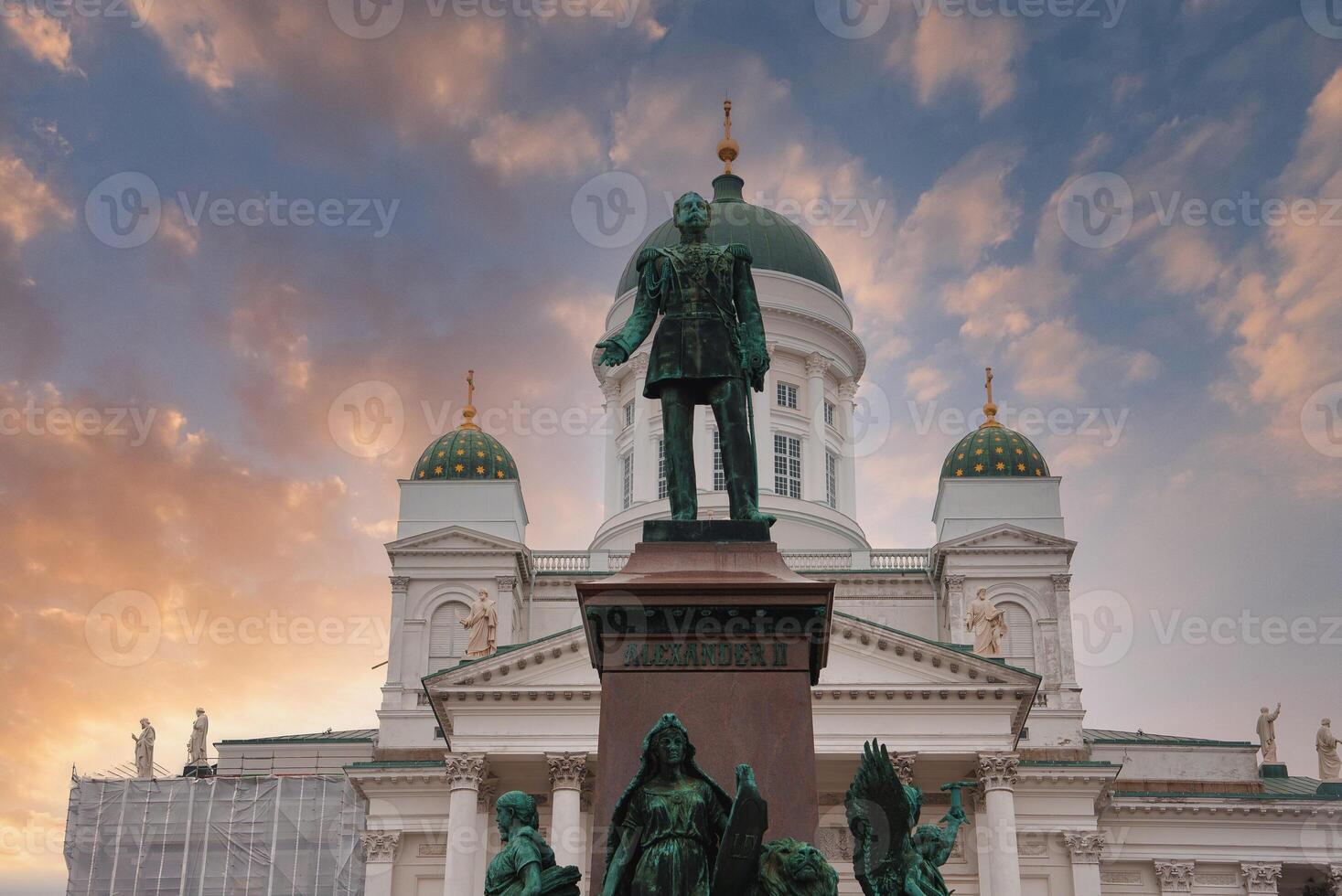 Helsinki Cathedral and Alexander II Statue at Sunset in Finland photo