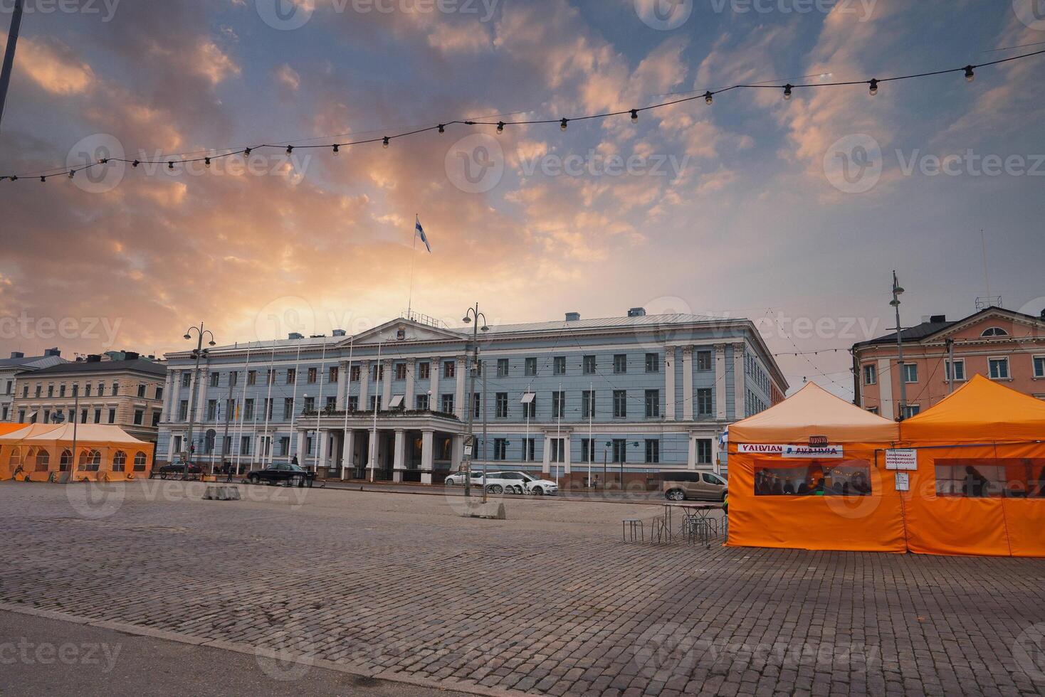Helsinki City Hall with Neoclassical Architecture at Sunset photo