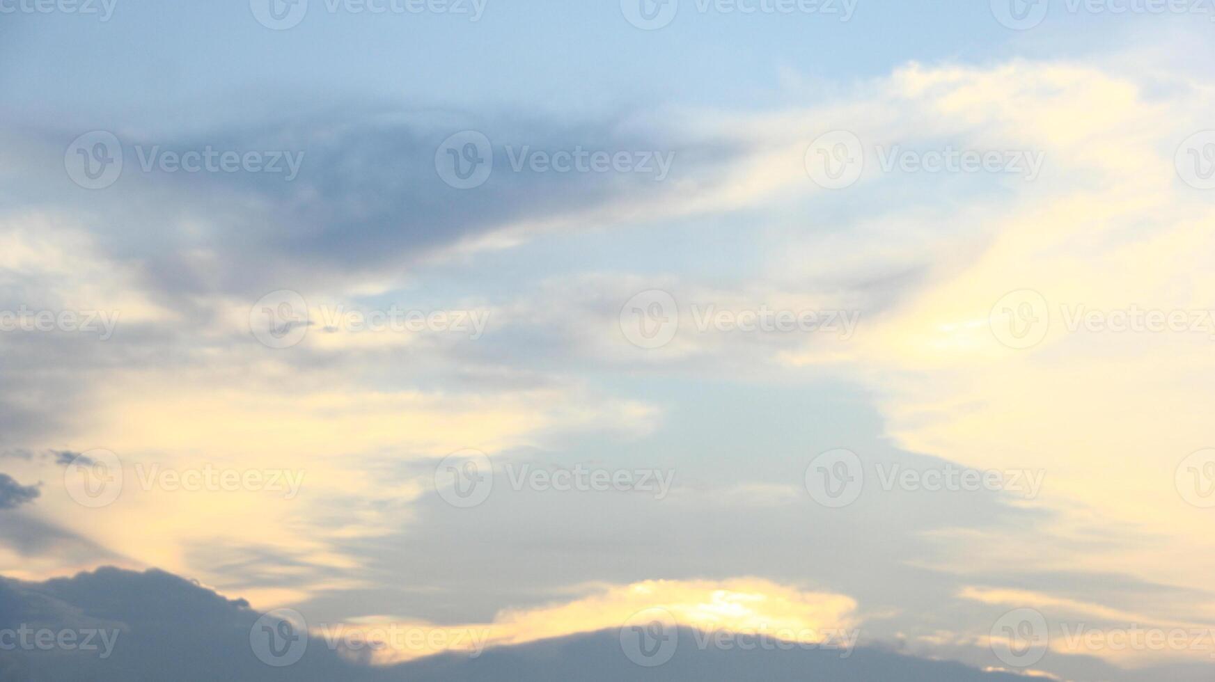 Majestic and surreal sunrise sky background with colorful clouds, golden hour photo
