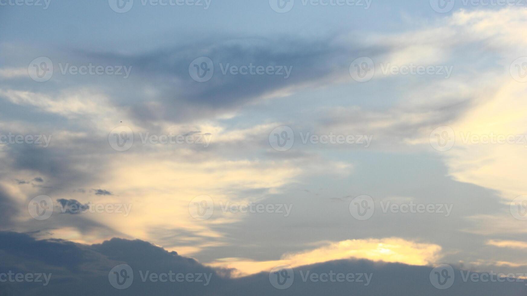 Majestic and surreal sunrise sky background with colorful clouds, golden hour photo