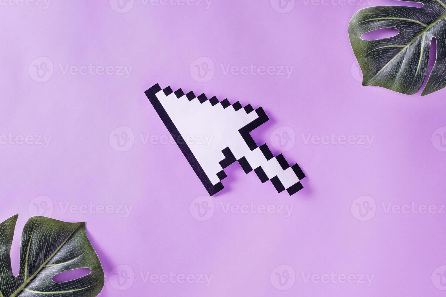 Arrow pointer is pixelated on pastel purple velvet background photo