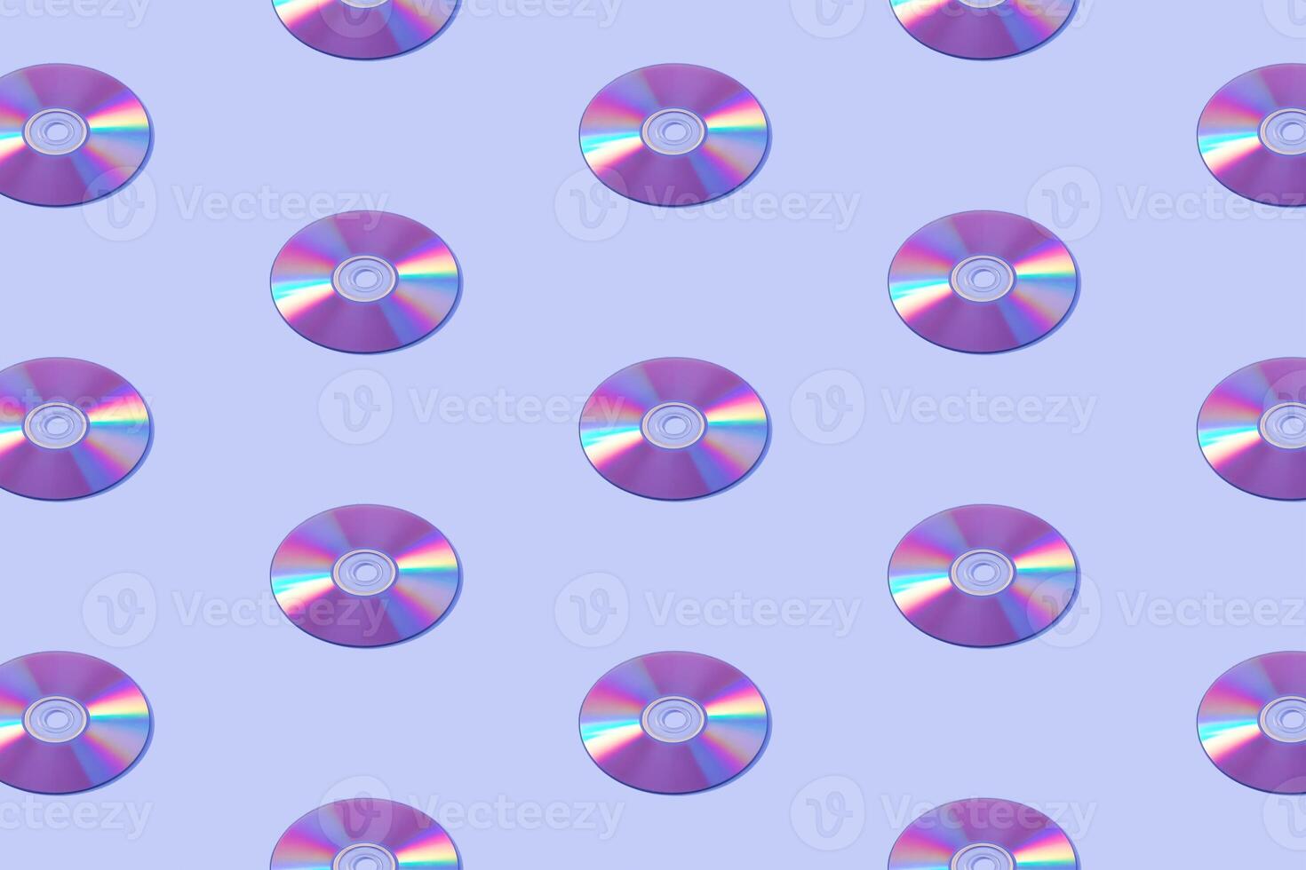 Database multimedia disk computer pattern on purple velvet background. photo