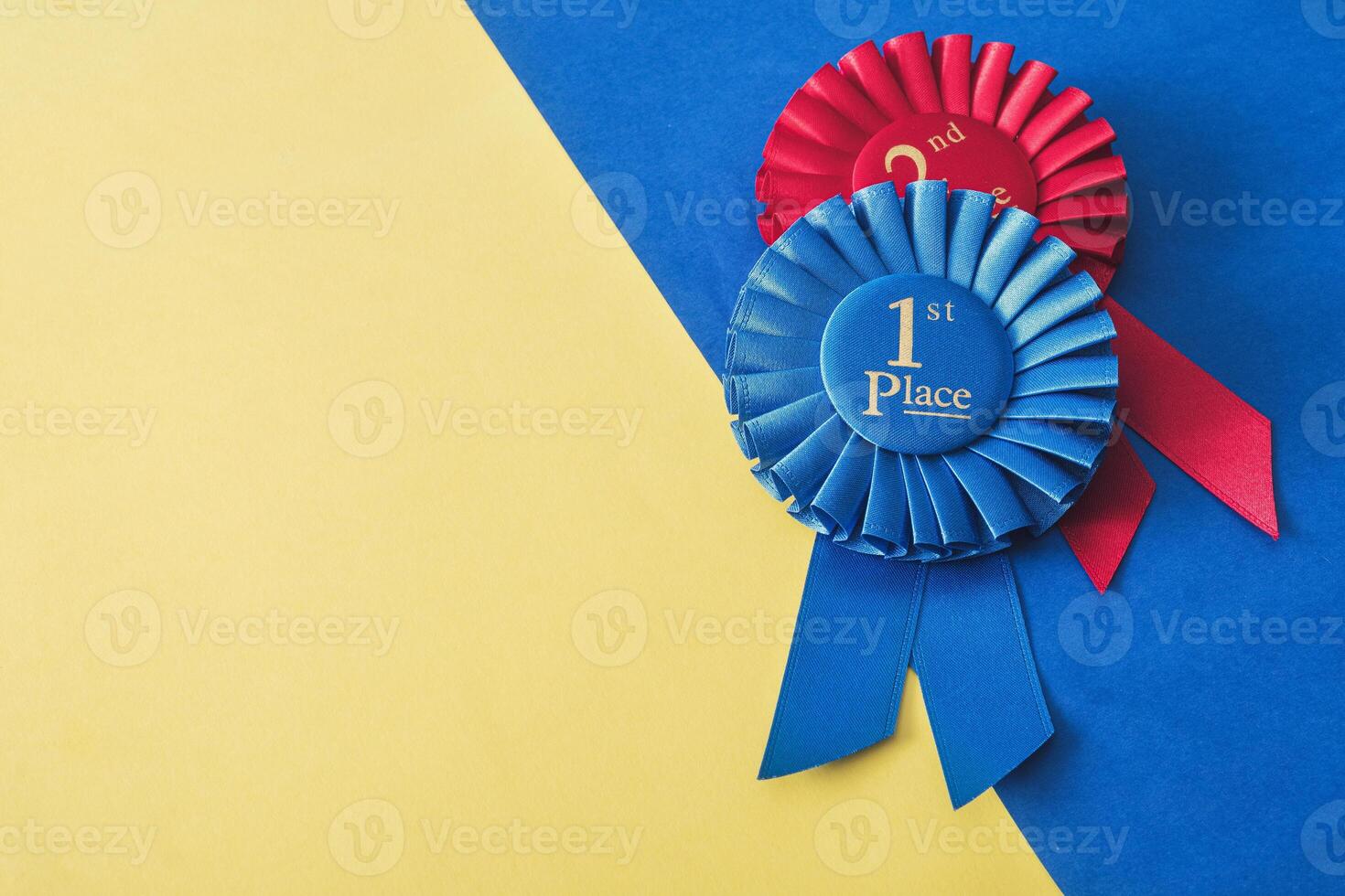 Winner and champion's award for success and goal achievement. Two rosette 1st and 2nd place. photo