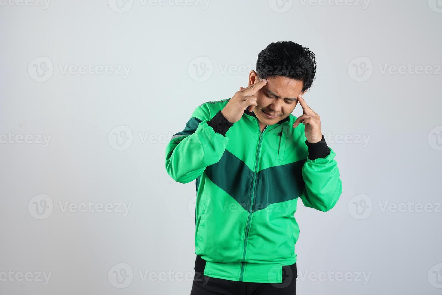Asian Male Online Driver Feel Headache photo