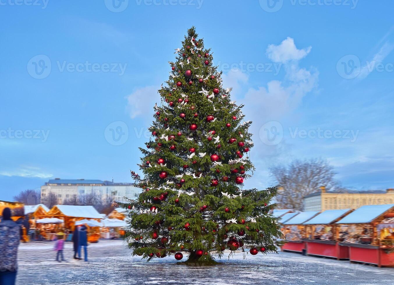 Decorated Christmas Tree in Outdoor Holiday Market photo