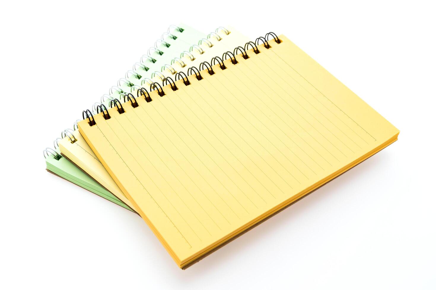 A yellow notebook with a spiral bound spiral notebook photo