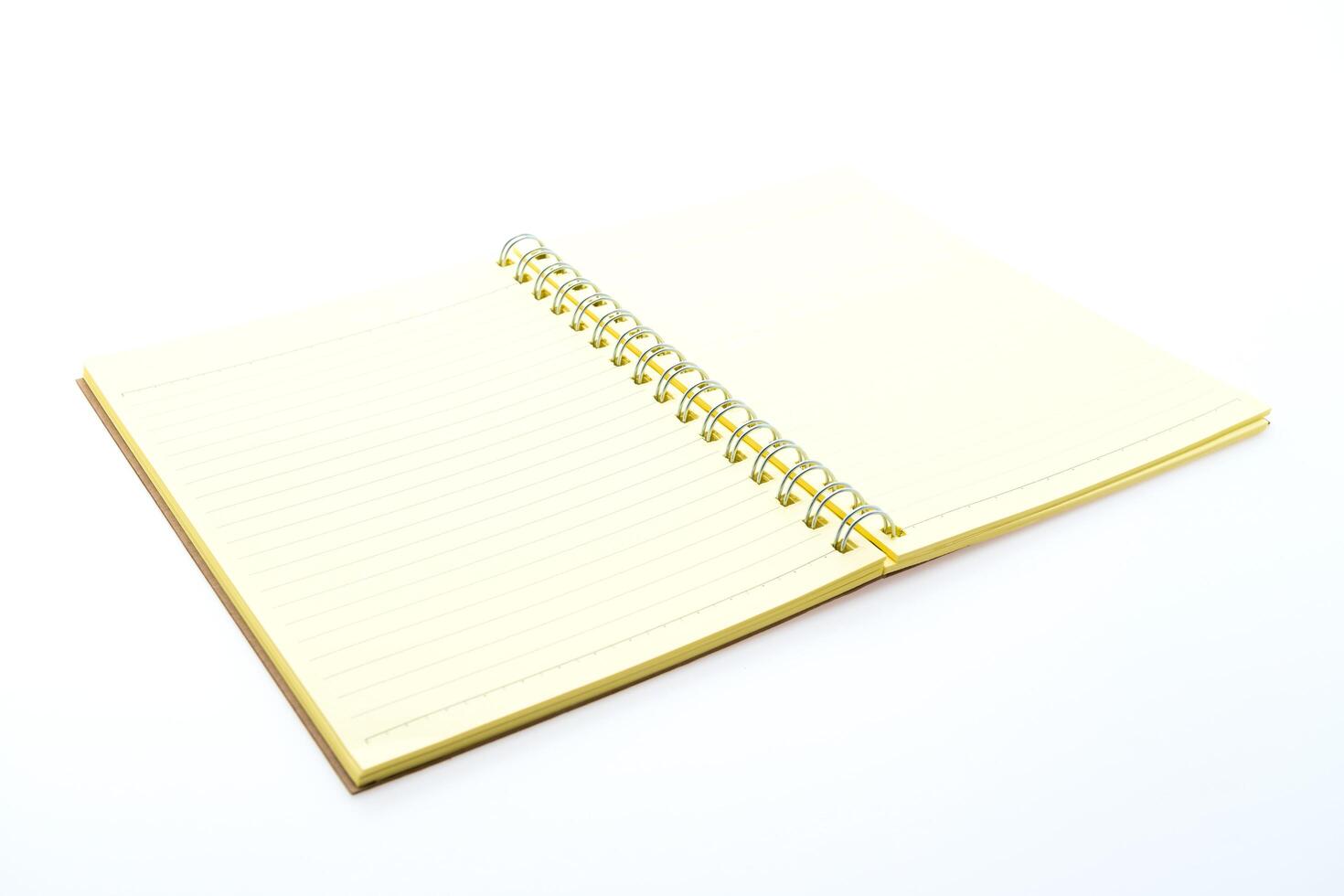 An open notebook with a spiral bound spiral notebook photo