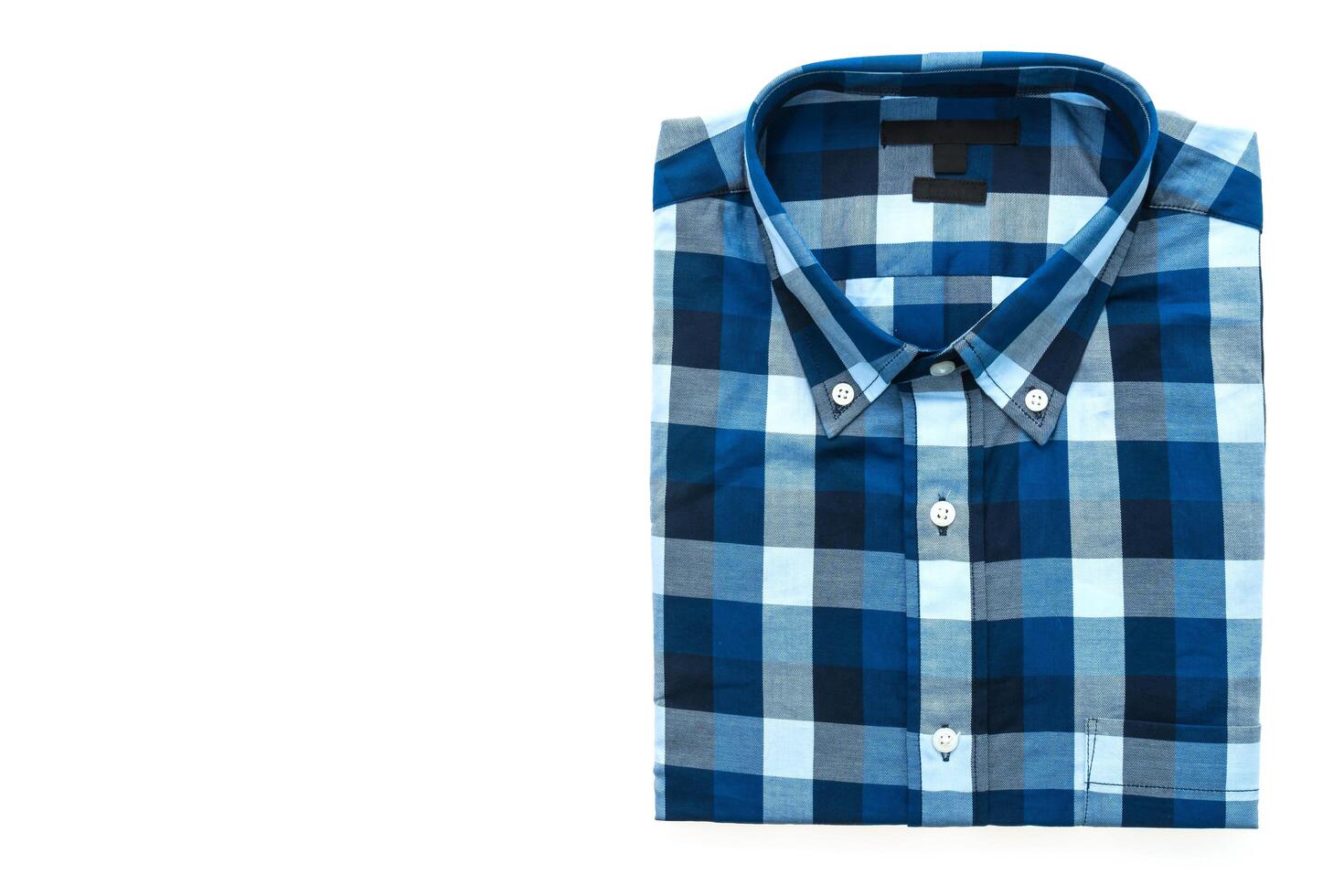 A blue and white checkered shirt on a white background photo