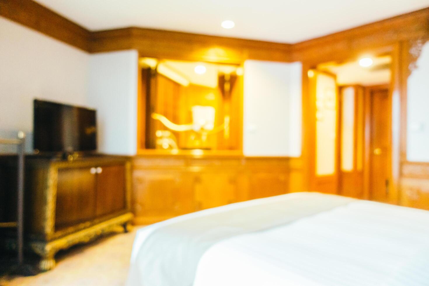 A bedroom with a bed and a tv photo