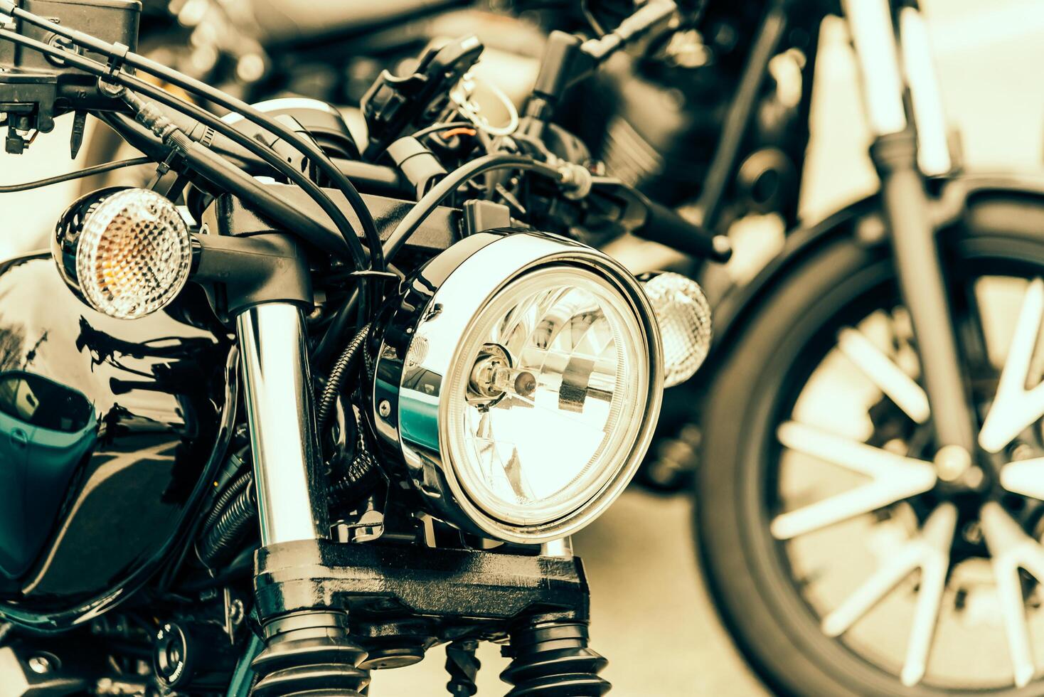 A close up of a motorcycle parked on a street photo