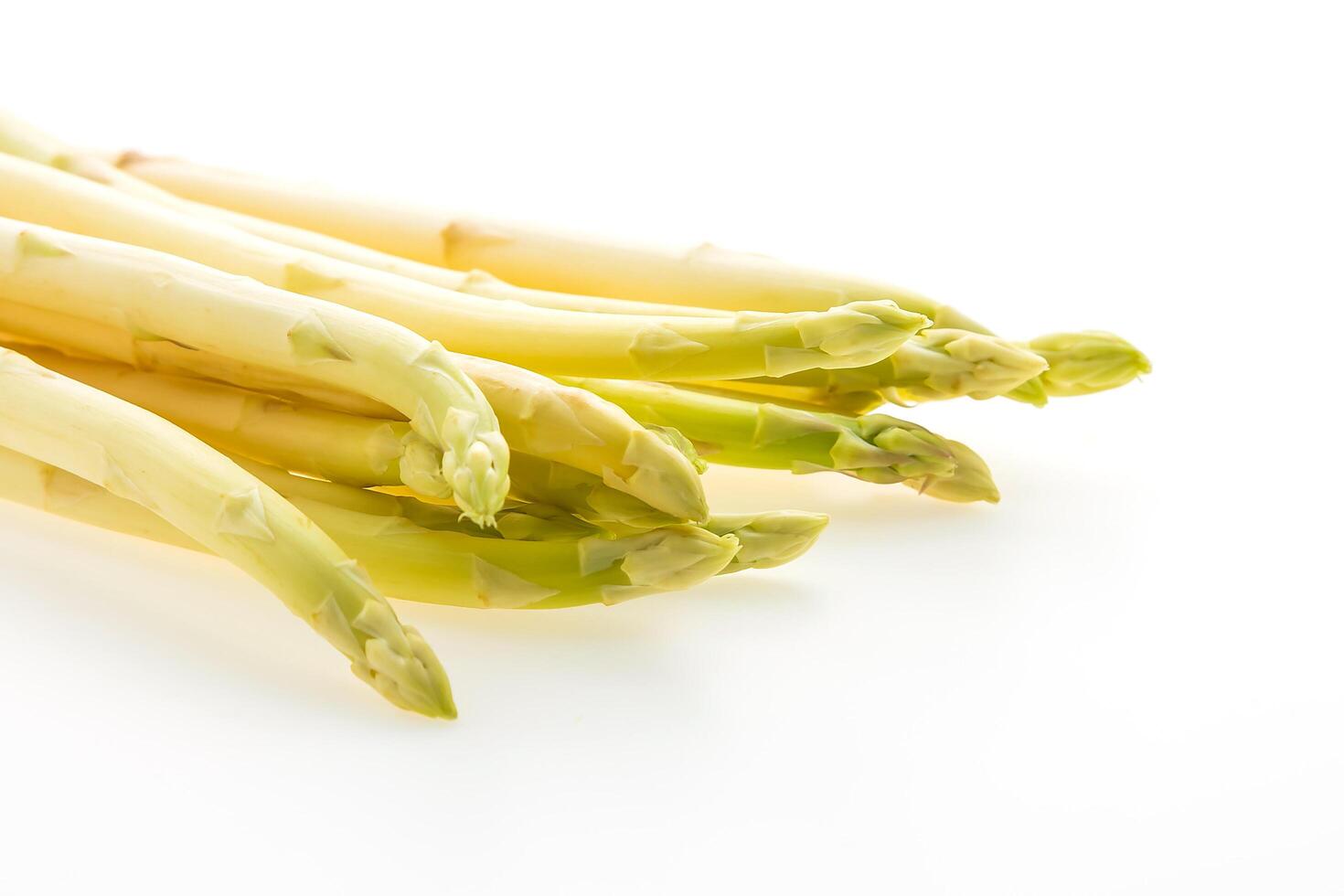 A bunch of asparagus on a white background photo