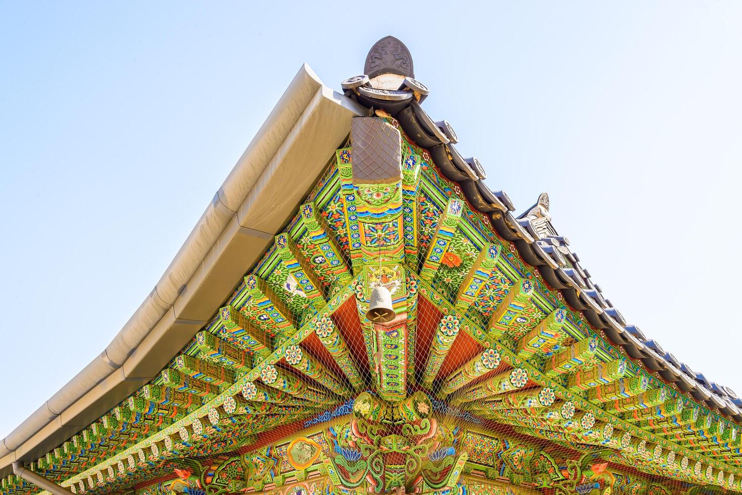 A colorful roof with a large statue of a horse photo