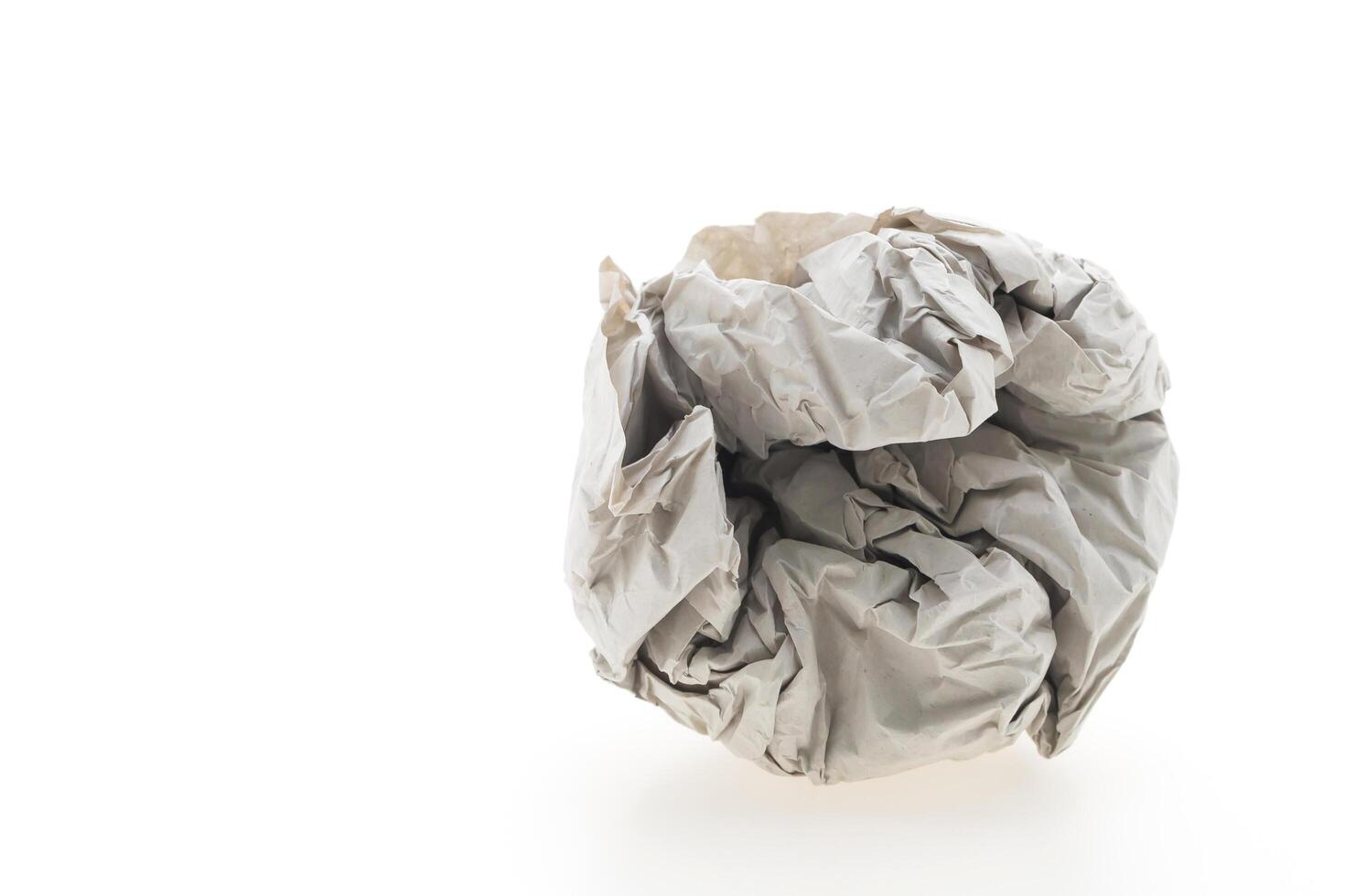 A pile of paper on a white surface photo