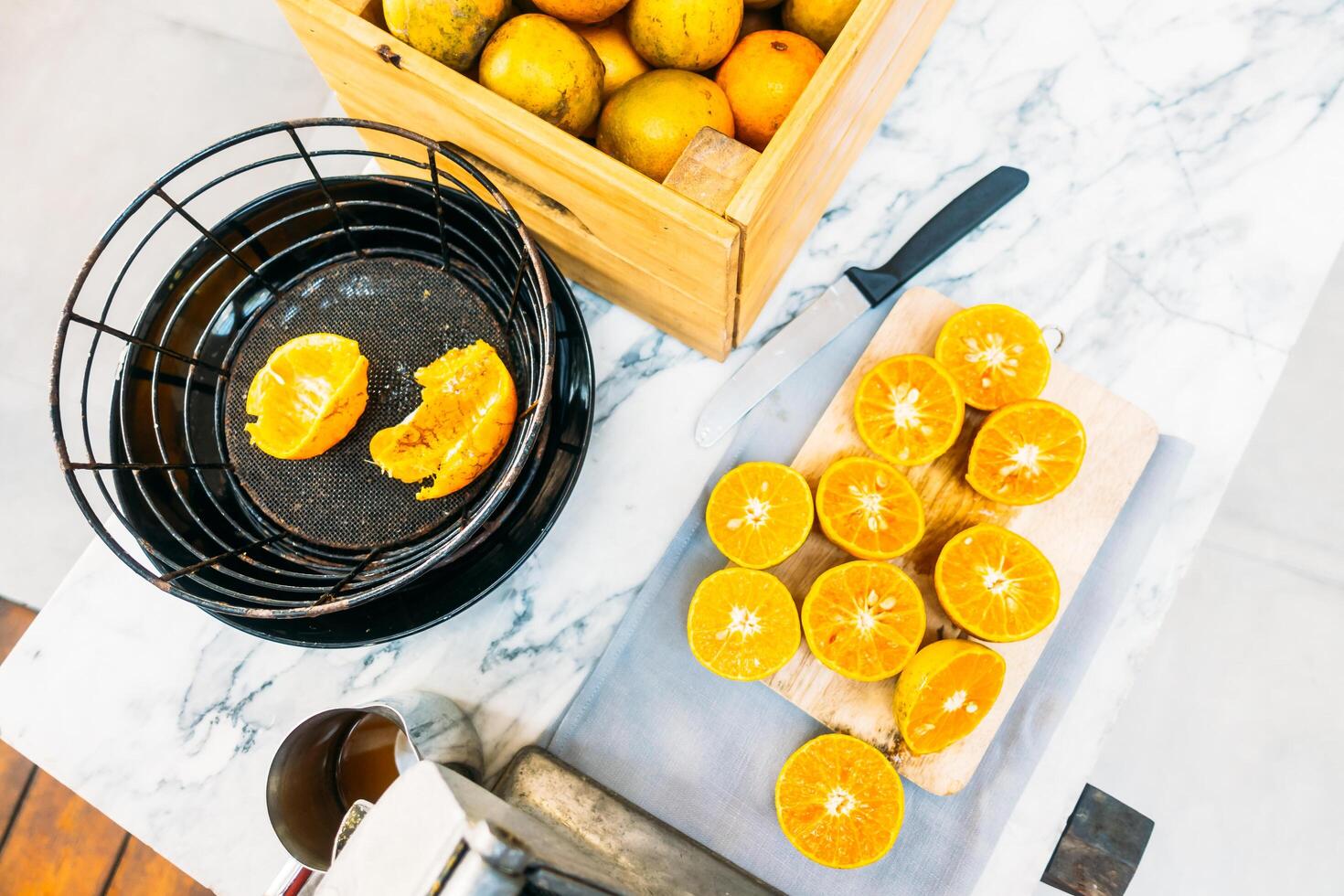 A wooden crate with oranges on it photo