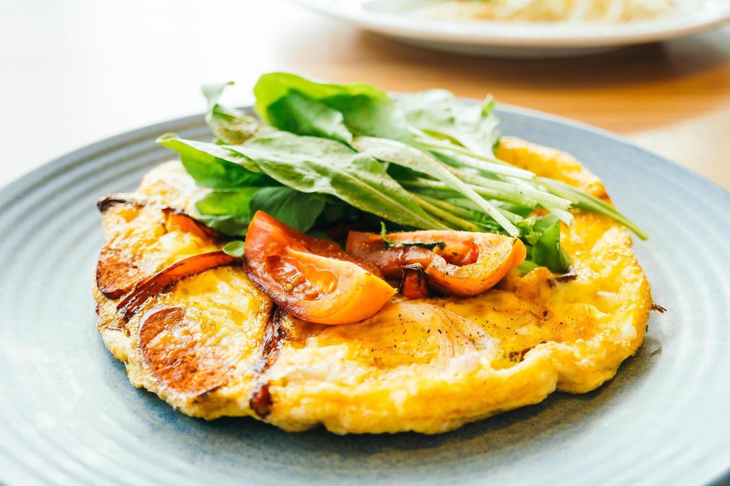 A plate of food with a salad on it photo