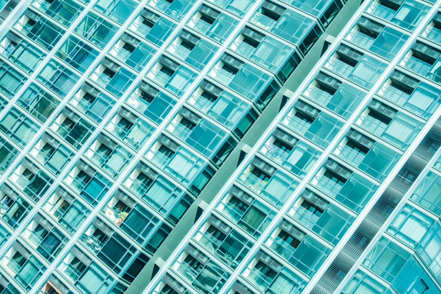 A view of a building with many windows photo