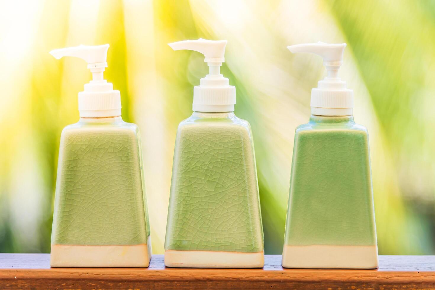 Three bottles of hand soap photo