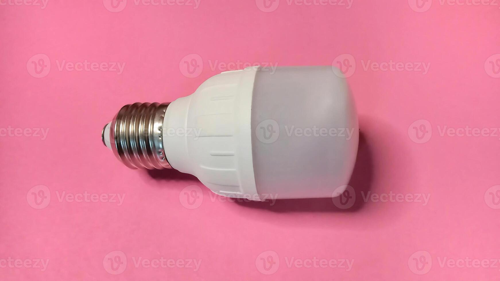 Energy efficient LED light bulb, close up view. Modern technology, eco friendly lighting solution. photo