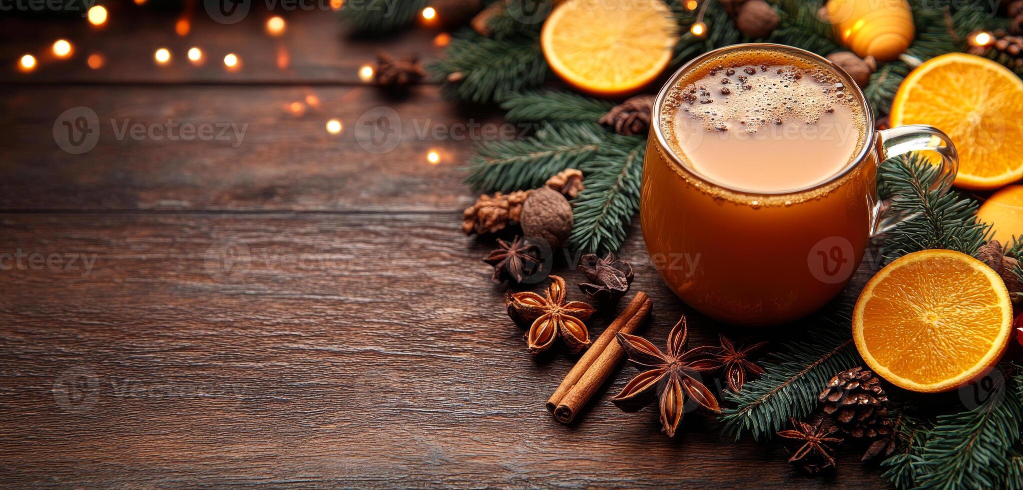 A mug of hot chocolate is surrounded by cinnamon sticks and oranges. The image conveys a cozy and warm atmosphere, perfect for a cold winter day photo