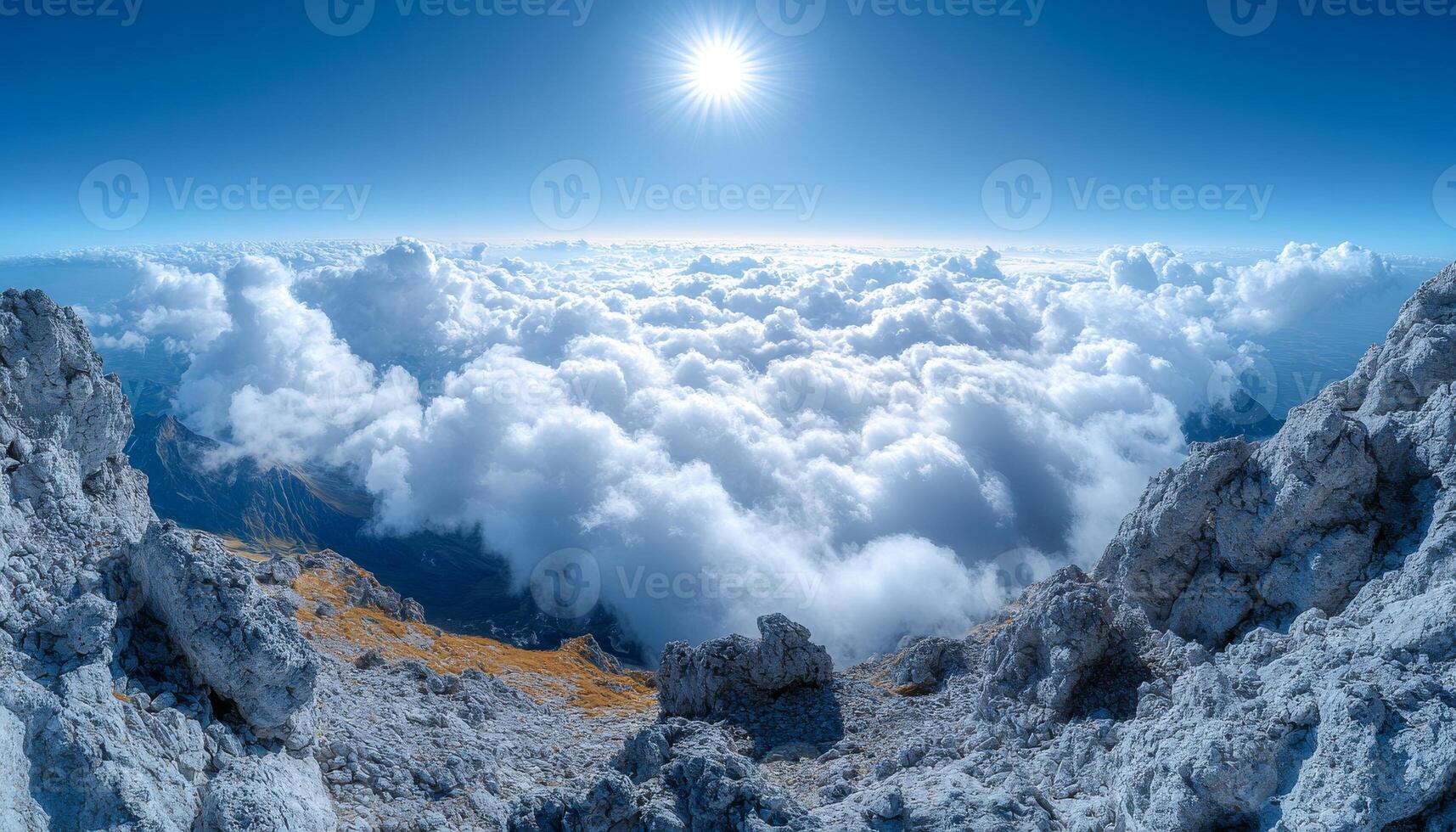 The sky is filled with clouds and the sun is shining brightly. Concept of peace and tranquility, as the clouds and sun create a serene atmosphere photo
