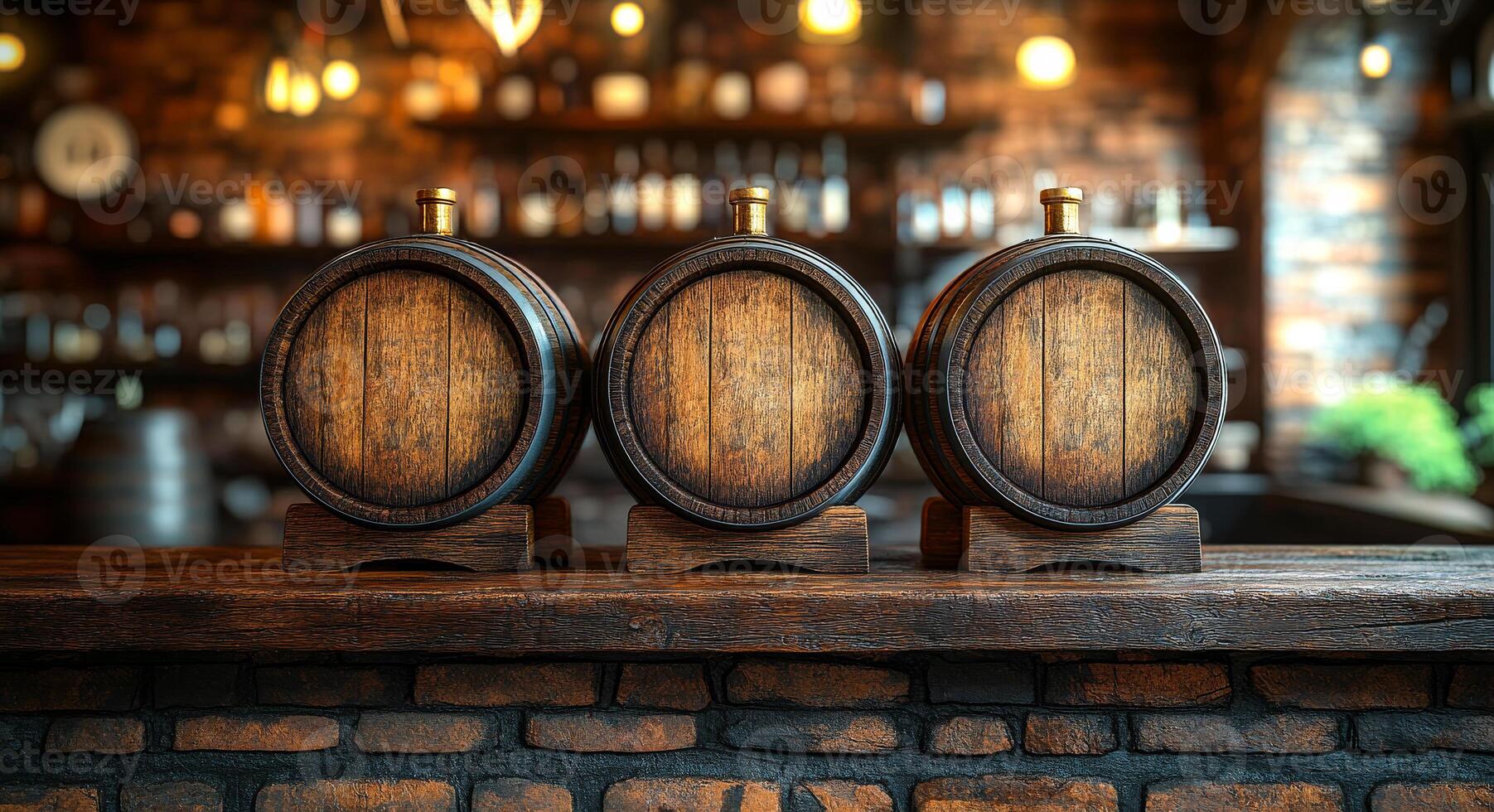 Three barrels of wood sit on a counter in a bar. The barrels are wooden and have a rustic appearance. The bar is filled with various bottles and glasses, giving the impression of a lively photo