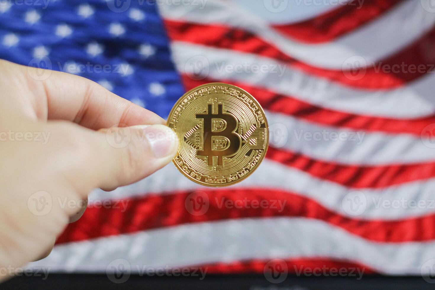 Physical Coin bitcoin with golden piece on USA flag. Bitcoin mining concept. photo