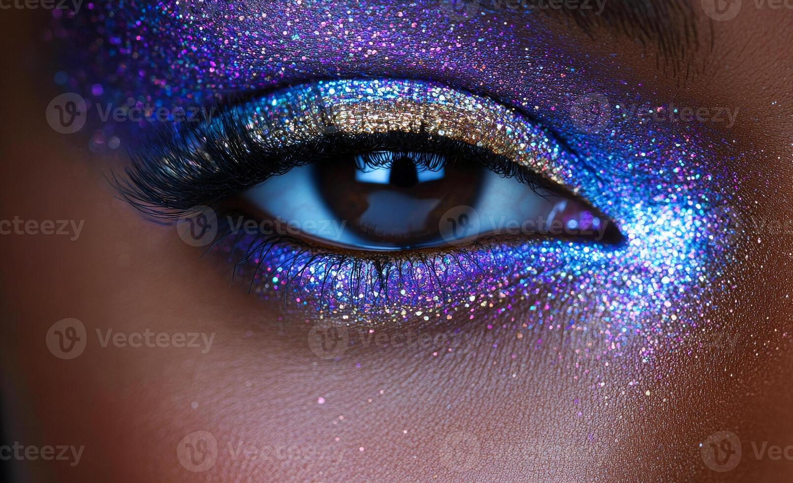 Colorful eye makeup with sparkles and shimmer. A close-up of an eye showcasing vibrant makeup featuring purple and blue sparkles and shimmering gold tones. photo