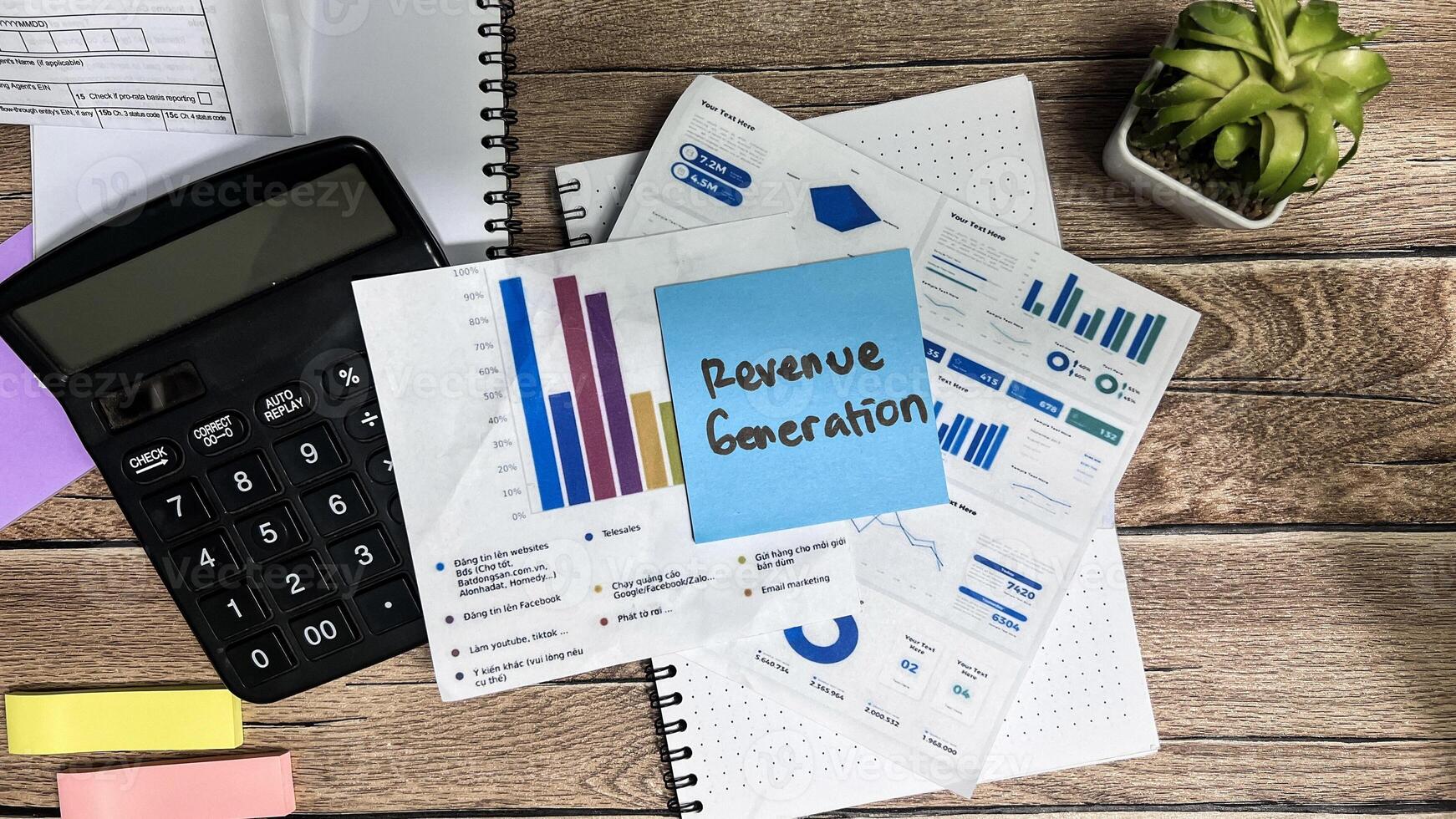 Concept of Revenue Generation write on sticky notes isolated on Wooden Table. photo